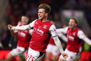 Pemain Fleetwood Town merayakan kemenangan atas Arsenal di Carabao Cup.