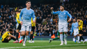Phil Foden merayakan gol saat Manchester City mengalahkan AEK Athens 5-1 di Liga Champions