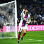 Achraf Hakimi merayakan hat-tricknya untuk PSG